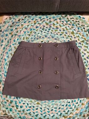 Johnnie B by Boden Double-Breasted A-Line Mini Skirt in military green. Size 30